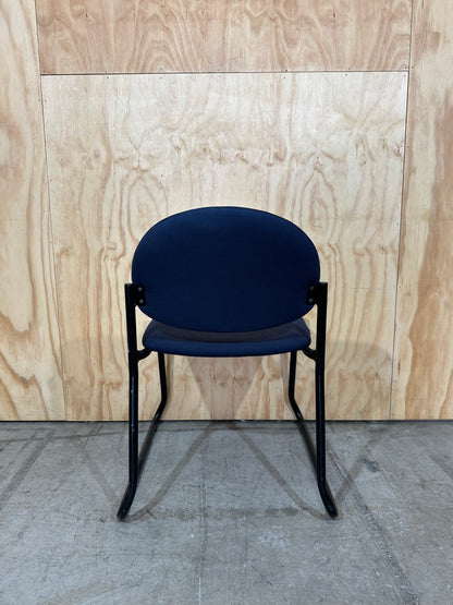 Upholstered blue visitor sled chair