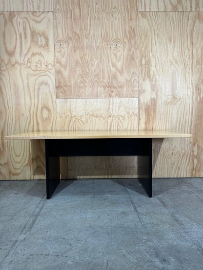 Rectangular meeting table on solid black base