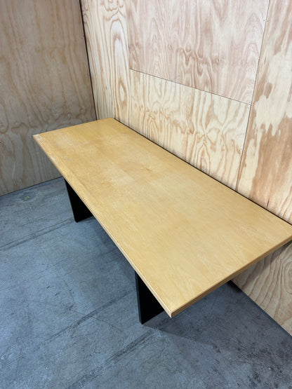 Rectangular meeting table on solid black base