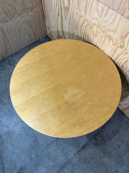 Round meeting table on black base