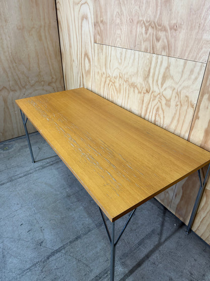 Timber topped table on chrome legs