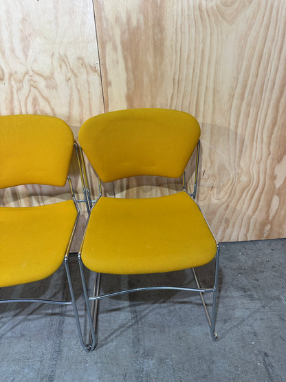 Set of 4 Stem Matrix fabric chairs on chrome frame in yellow