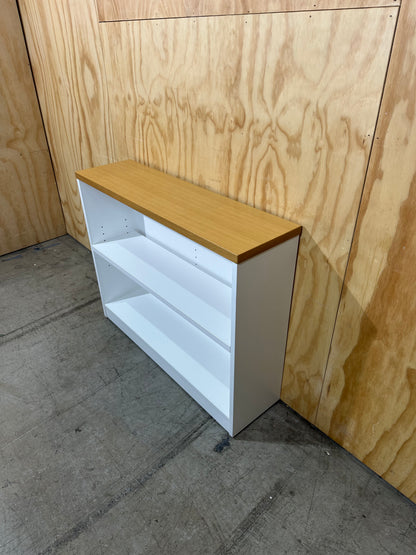 Wide white bookcase with timber top