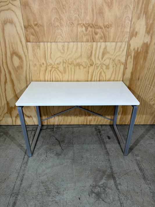 White table on solid metal base by Amart