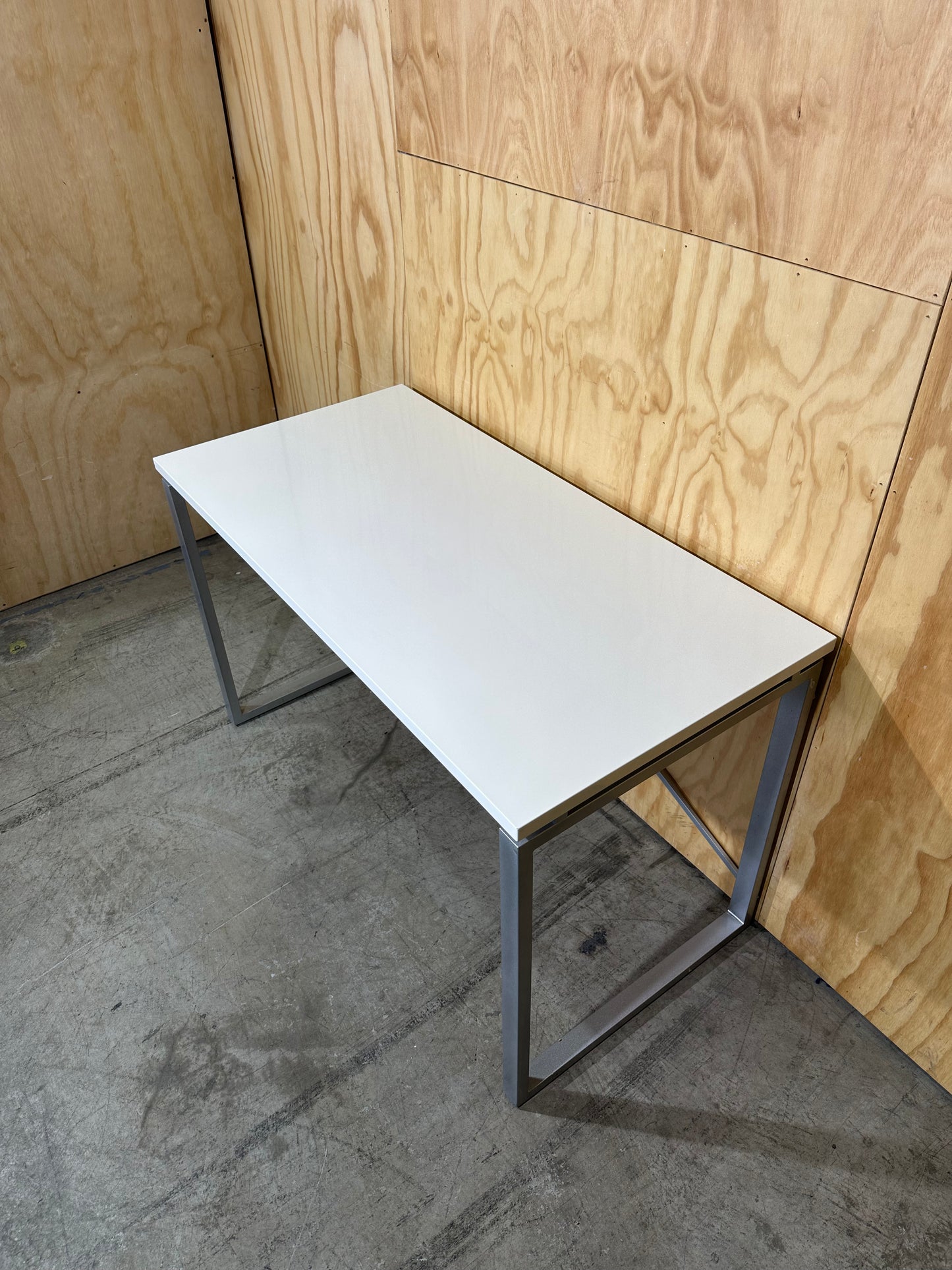 White table on solid metal base by Amart