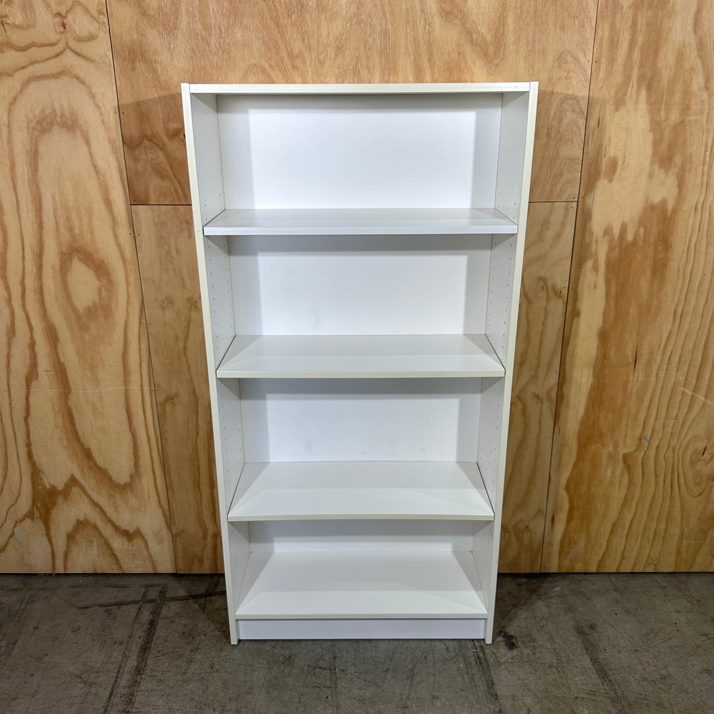 White wooden bookshelf