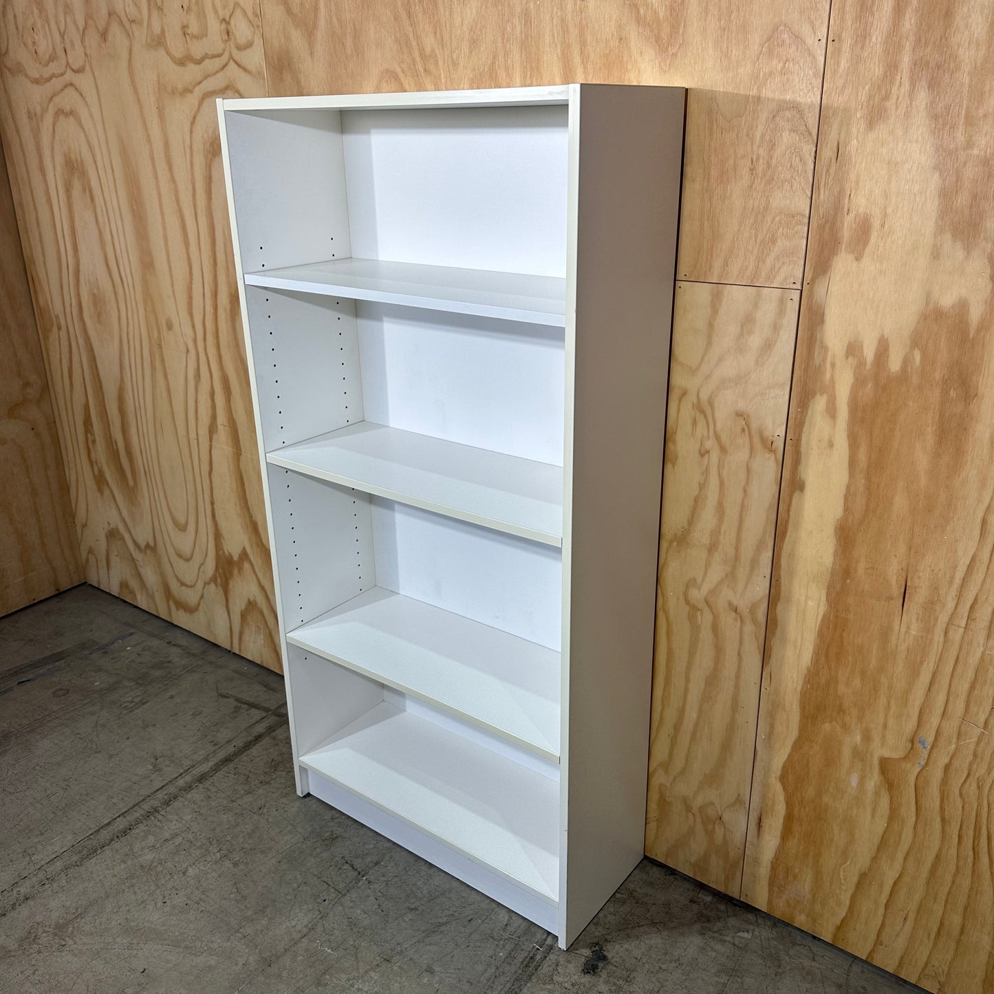 White wooden bookshelf