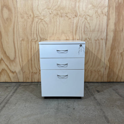 White pedestal with chrome handles on wheels
