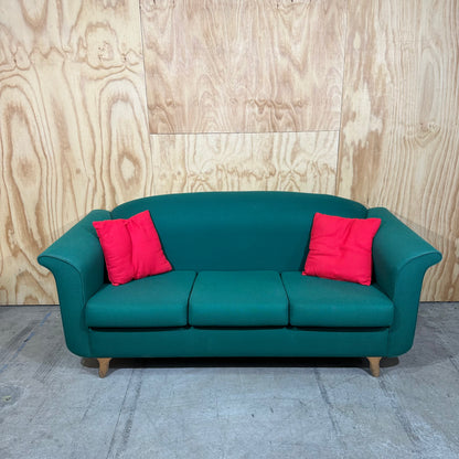 Three seater couch in emerald greeen