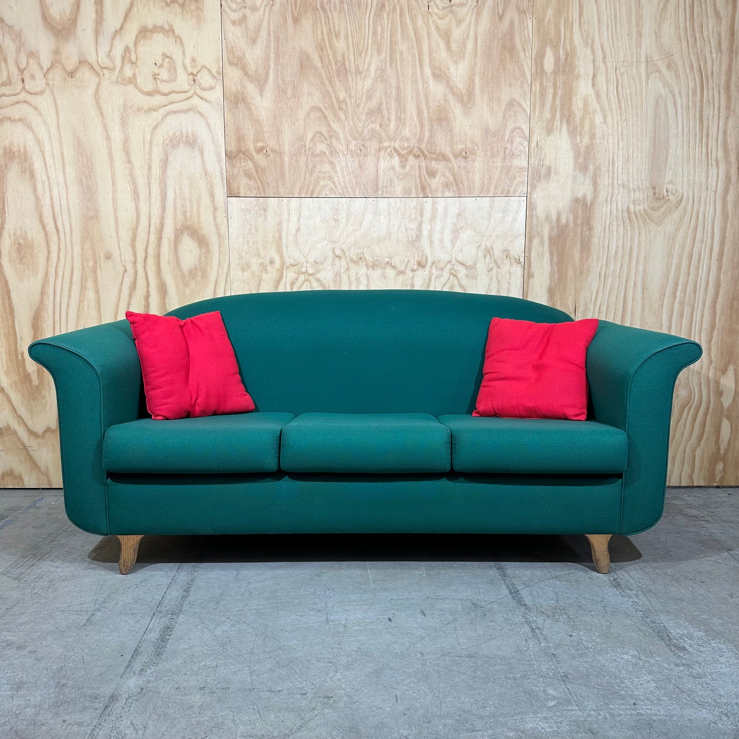 Three seater couch in emerald greeen