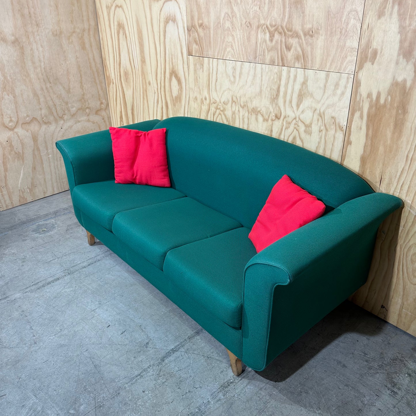 Three seater couch in emerald greeen