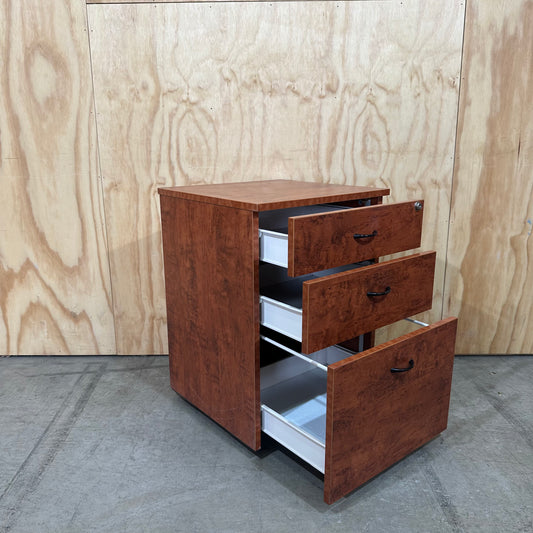 Wood veneer three drawer pedestal
