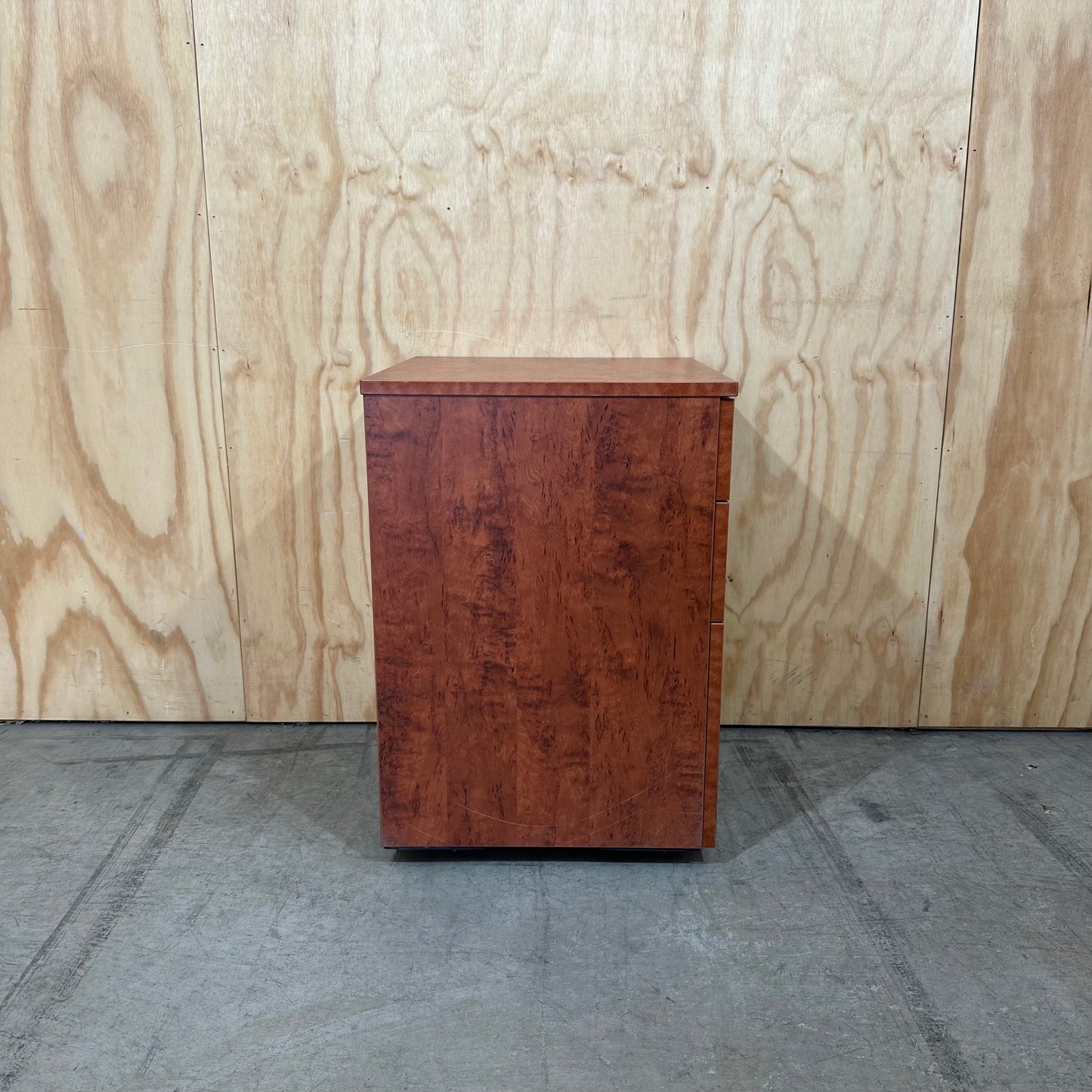 Wood veneer three drawer pedestal