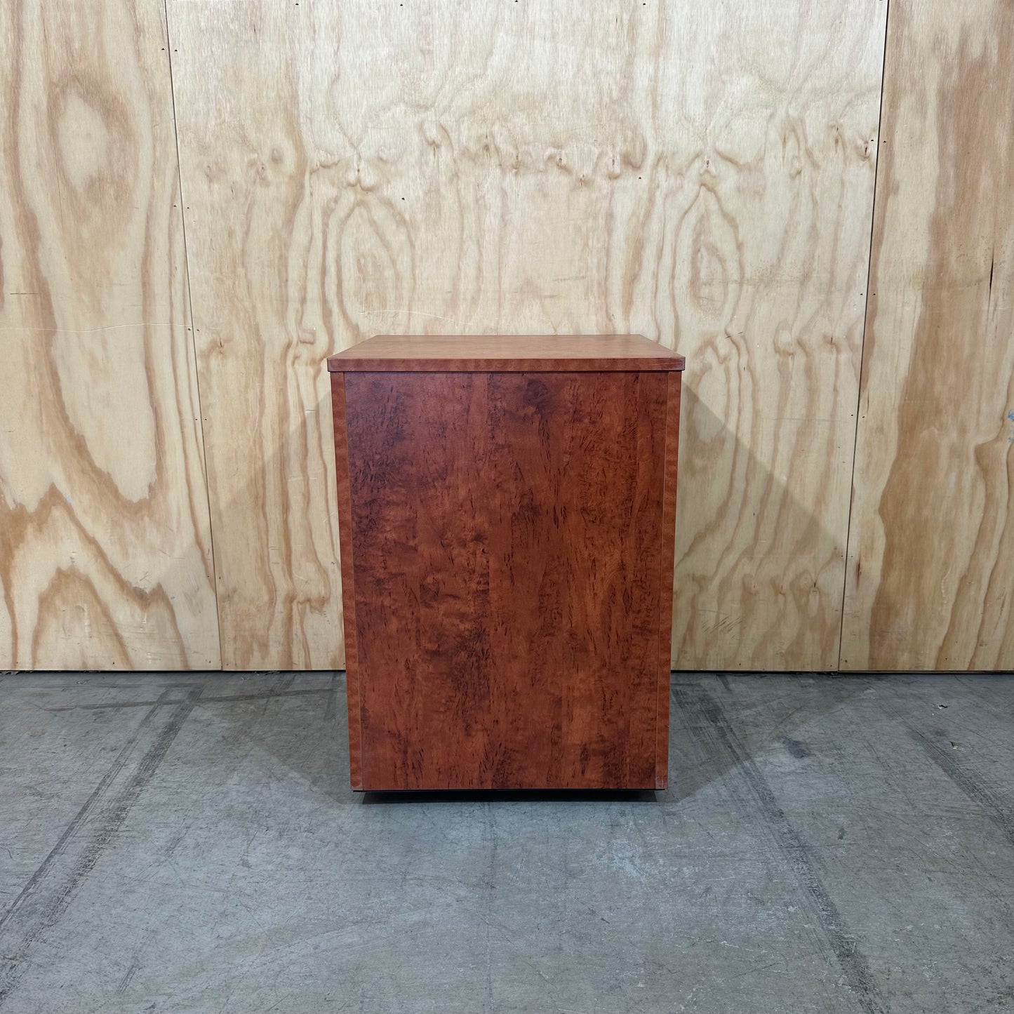 Wood veneer three drawer pedestal