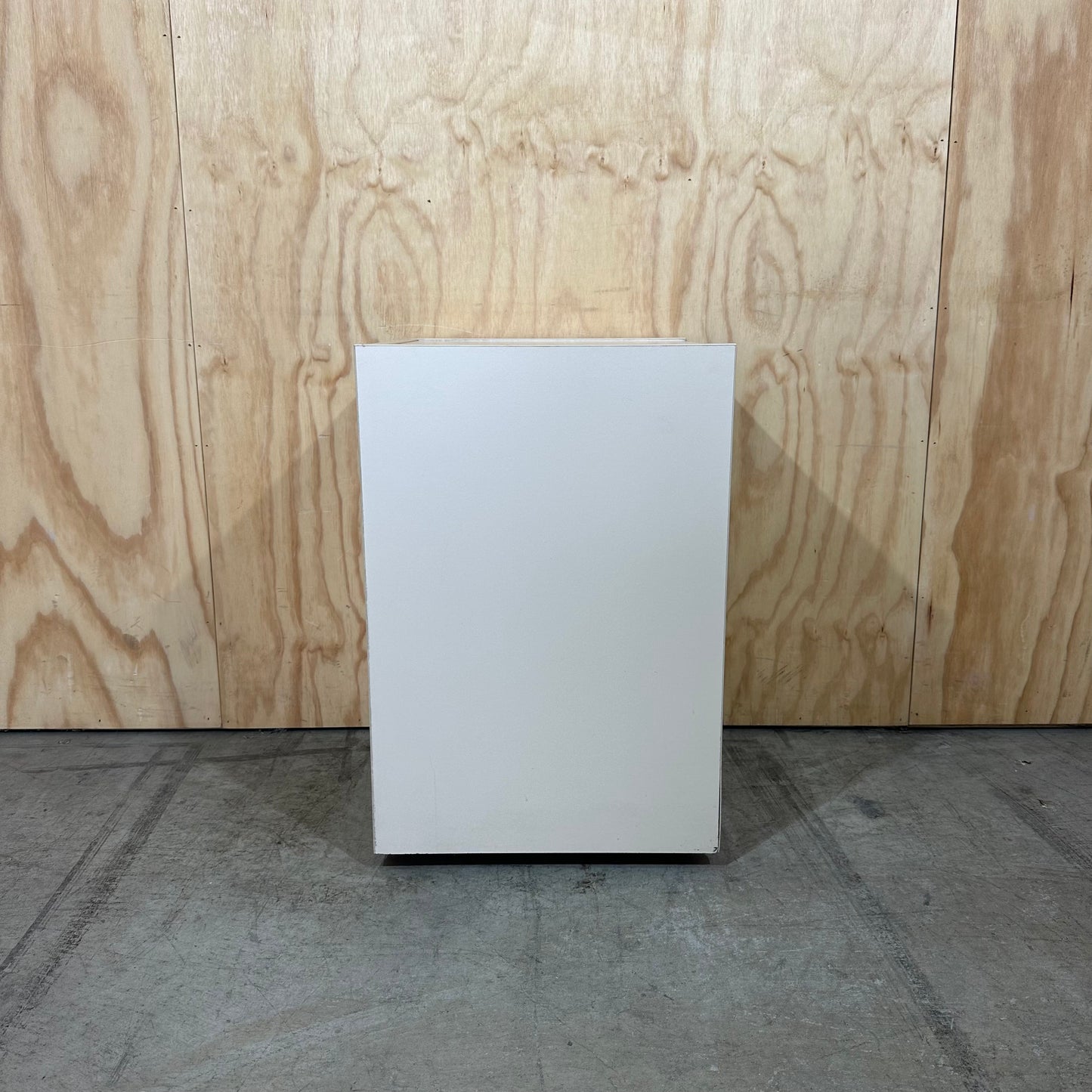 Beige three drawer pedestal