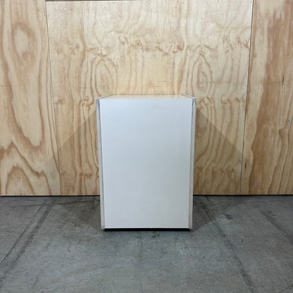 Beige three drawer pedestal