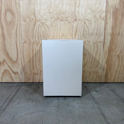 Beige three drawer pedestal