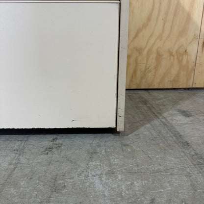 Beige three drawer pedestal