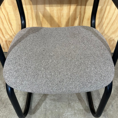 Light grey cantilever visitor chair with black frame