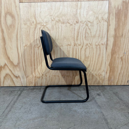 Navy upholstered sled base visitor chair