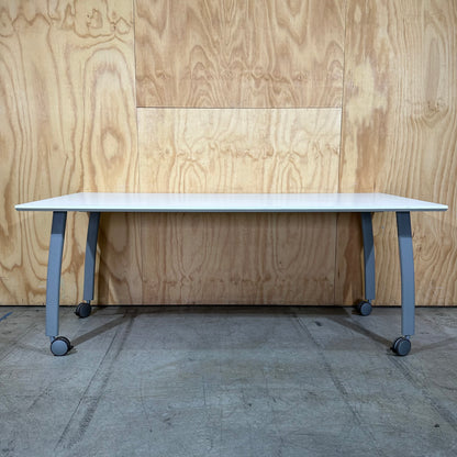 White Table on Castor Wheels