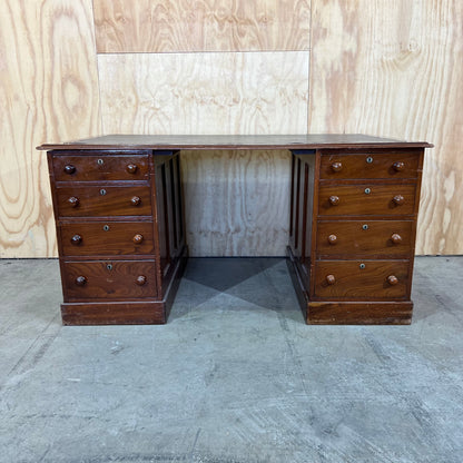 Antique timber executive desk with black leather top