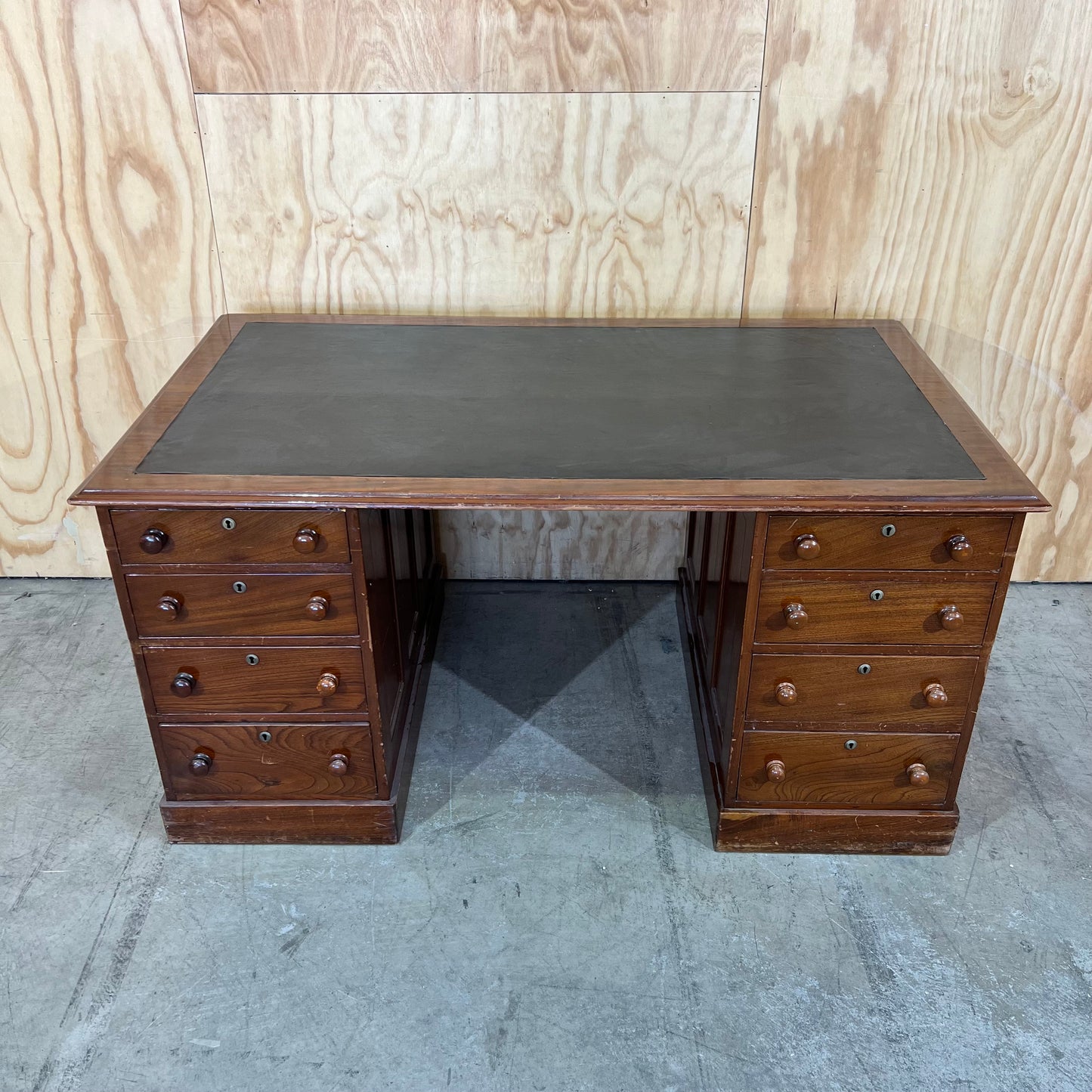 Antique timber executive desk with black leather top