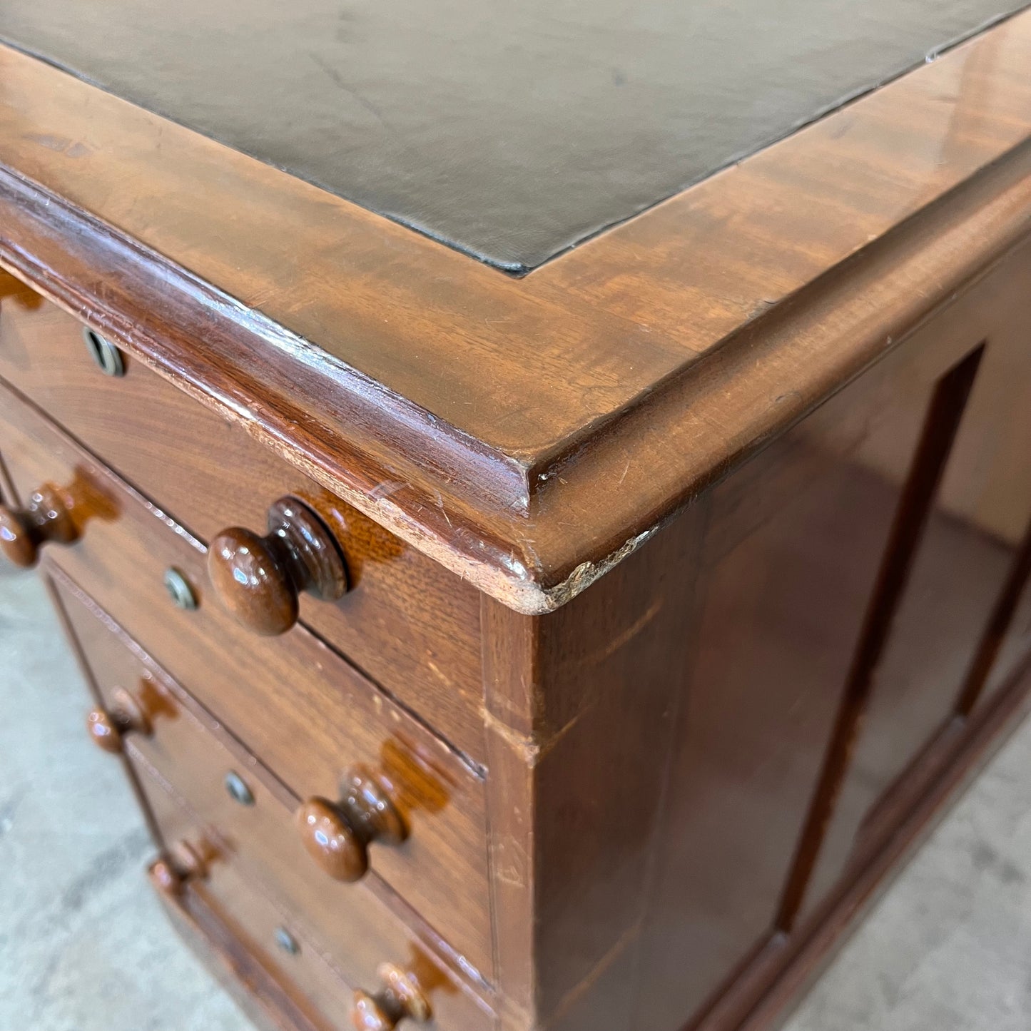 Antique timber executive desk with black leather top