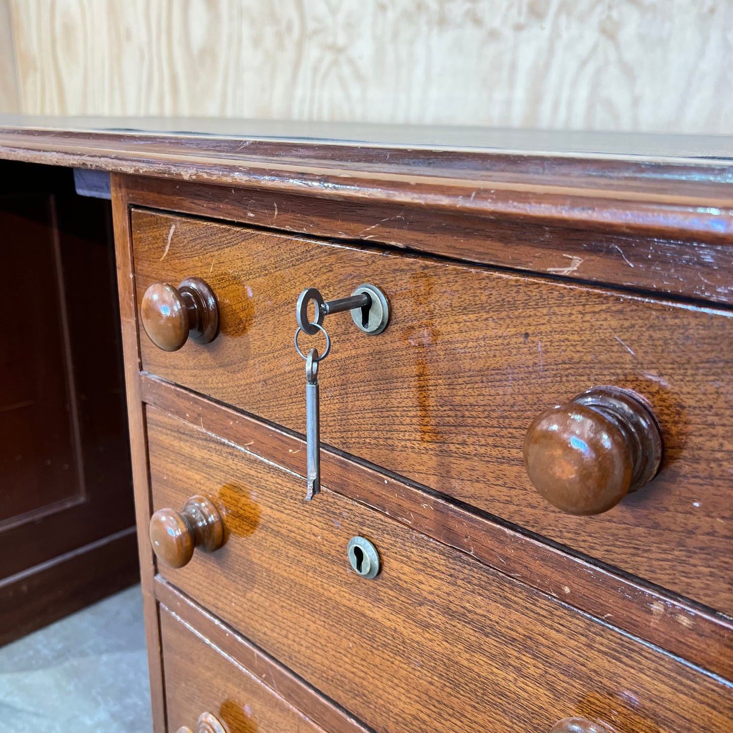 Antique timber executive desk with black leather top