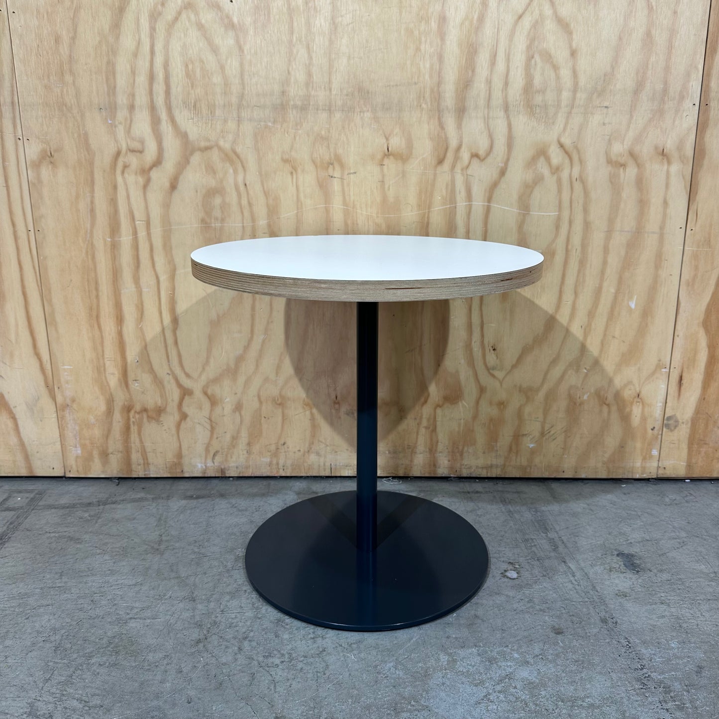 Round Coffee Table with Plywood Edge on Black Base