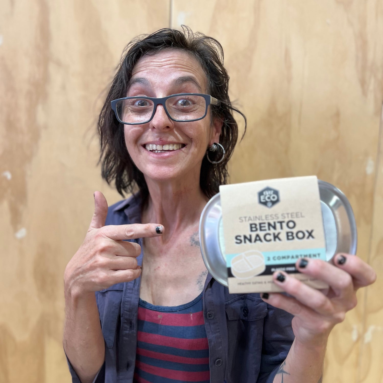 Molly holding a home & lifestyle ethical good of a Bento Snack Box / sustainable option
