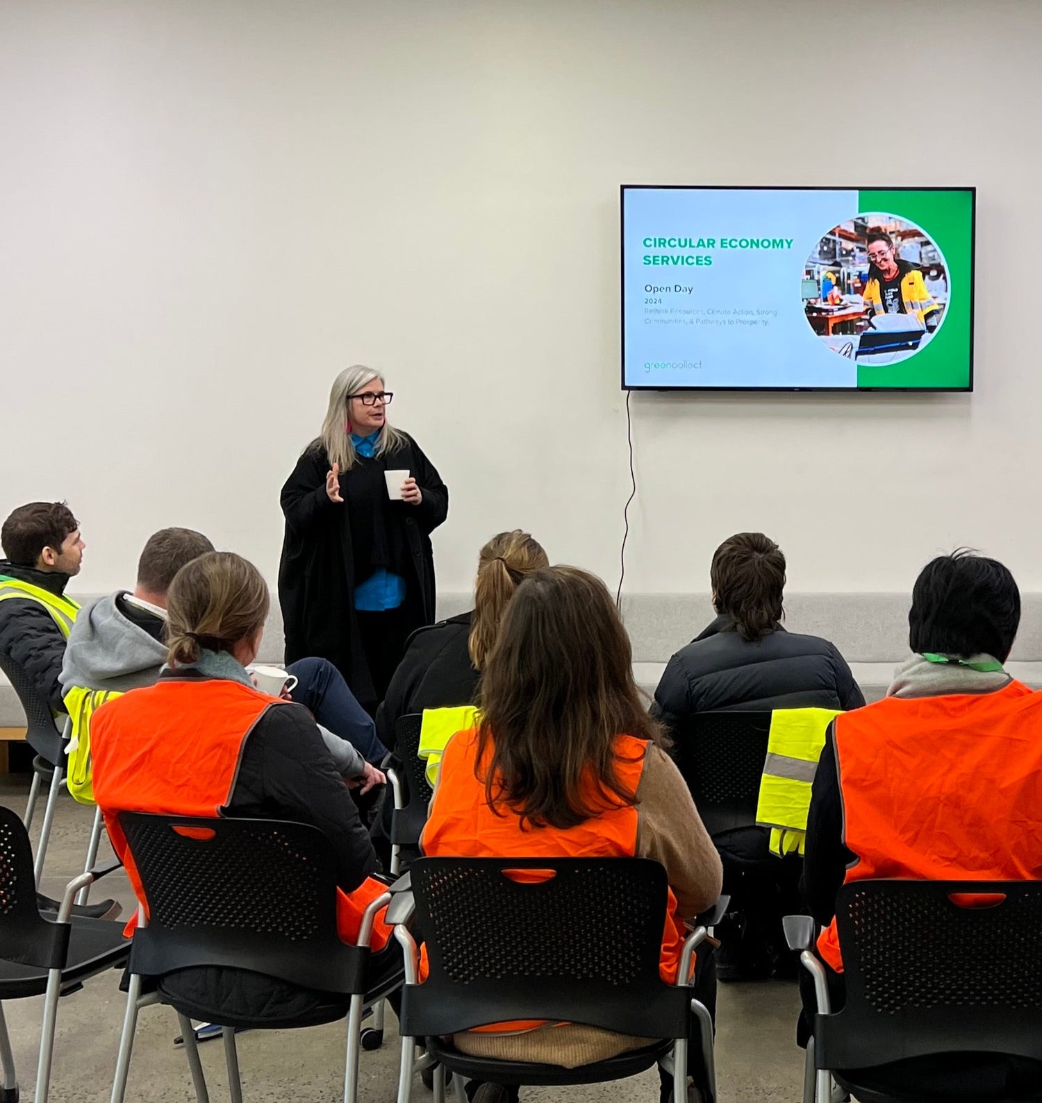 Group of Green Collect team in high vis vests upskilling with circualr economy training and knowledge