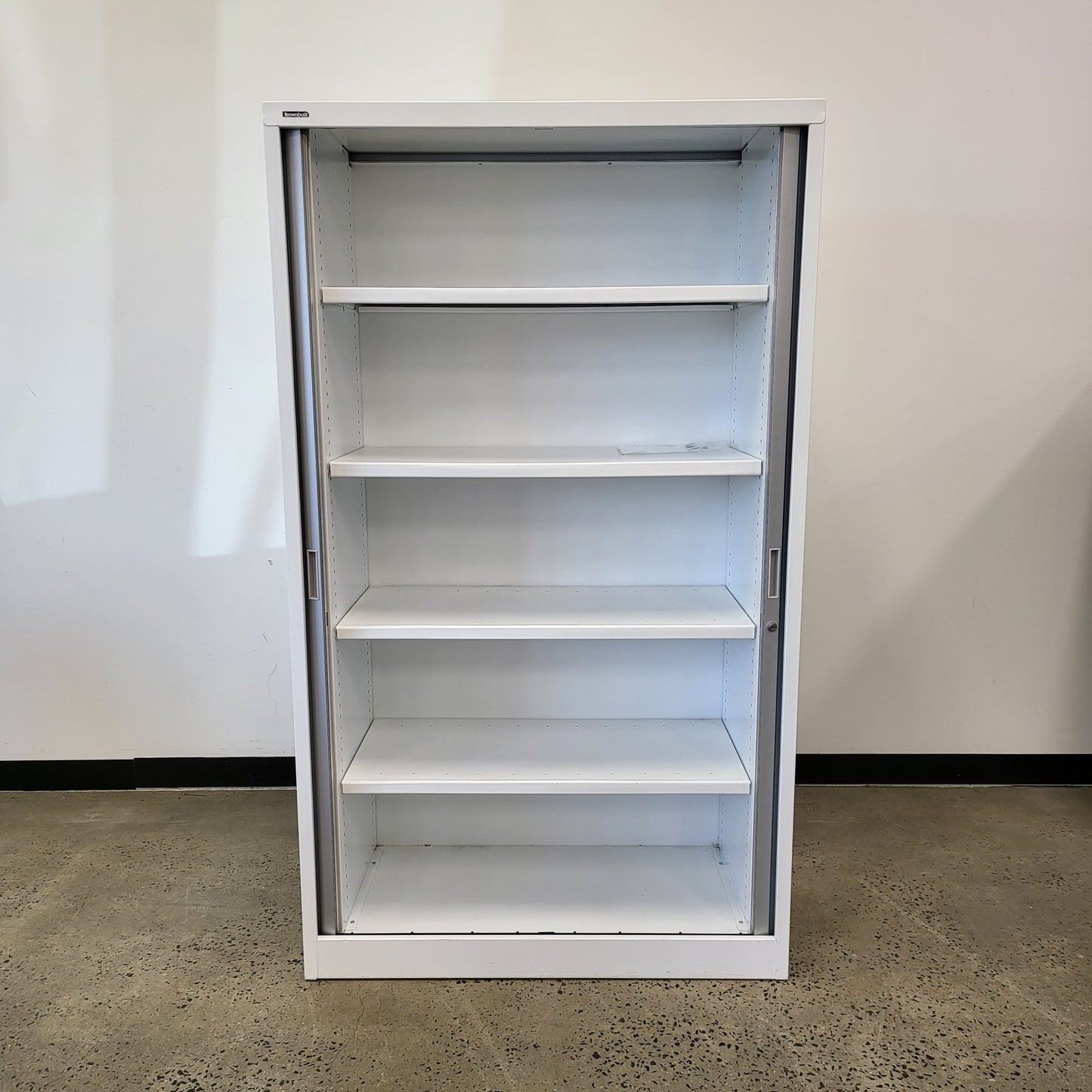 Large Brownbuilt Tambour in White