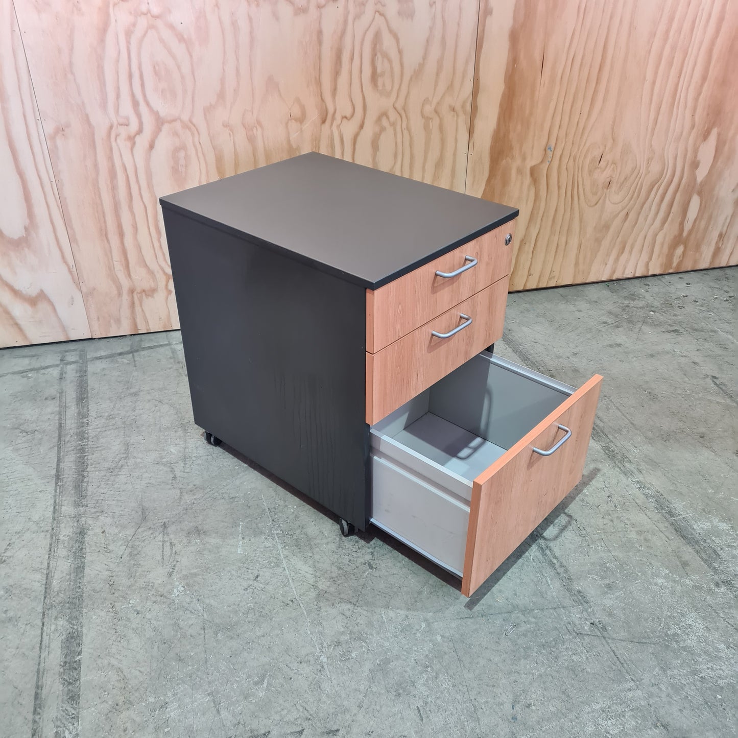 Charcoal and tan pedestal